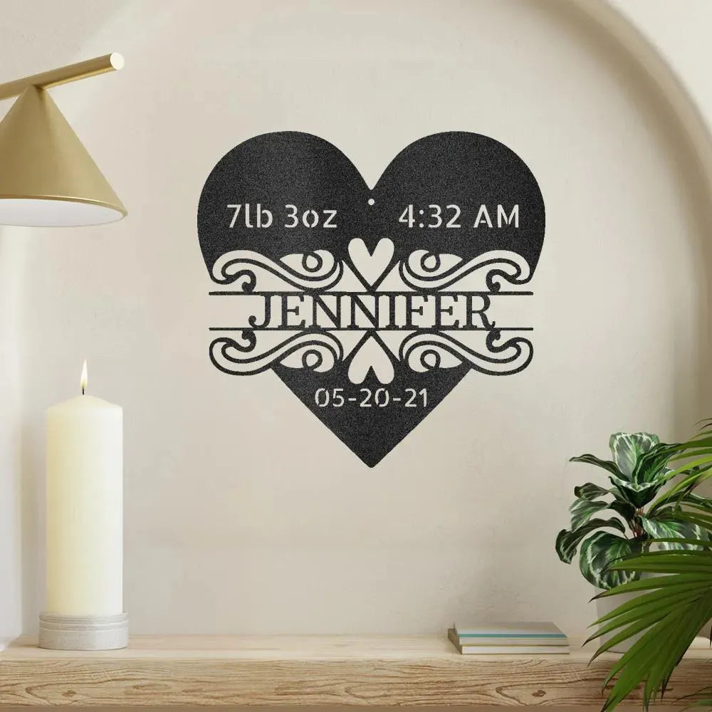 Black metal heart wall art with "Jennifer," birth weight, time, and date for a newborn.