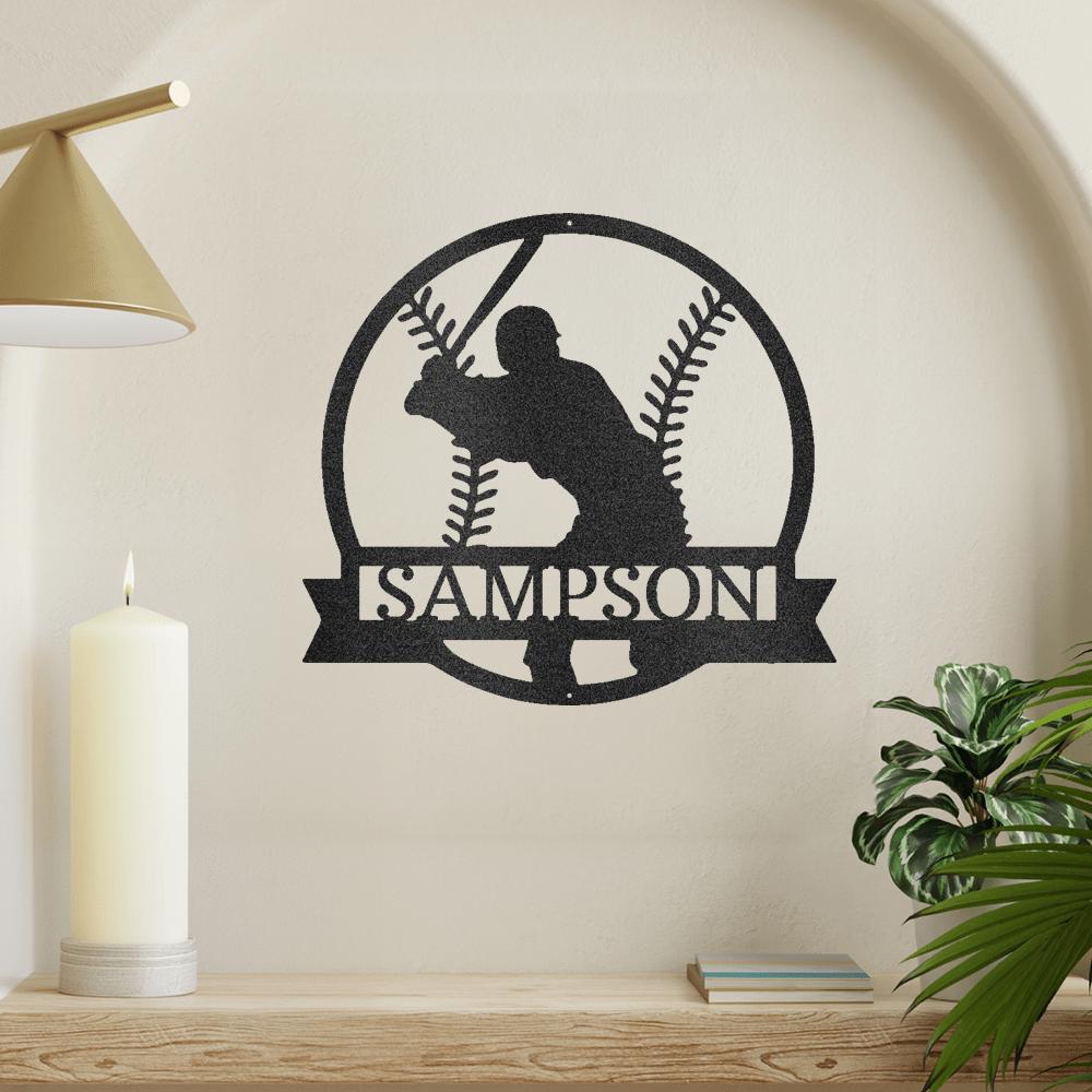 Black metal baseball monogram wall art featuring a batter silhouette and "SAMPSON" in a banner.