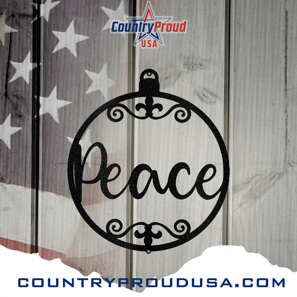 Black powder-coated steel "Peace" ornament metal wall art on a rustic wood and flag background.