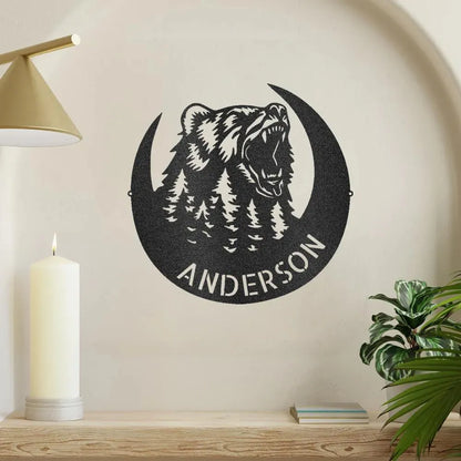 Black metal Roaring Bear Monogram wall art with "Anderson" text, crescent moon, and pine trees.