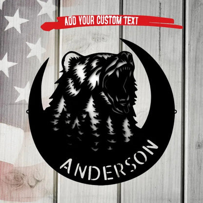 Black metal roaring bear and forest crescent moon monogram sign with "ANDERSON" text.