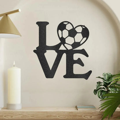 Black metal "LOVE" wall art with a soccer ball replacing the "O".