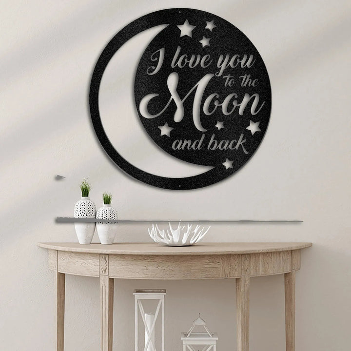 Black metal "I love you to the Moon and back" wall art with crescent moon and stars design.