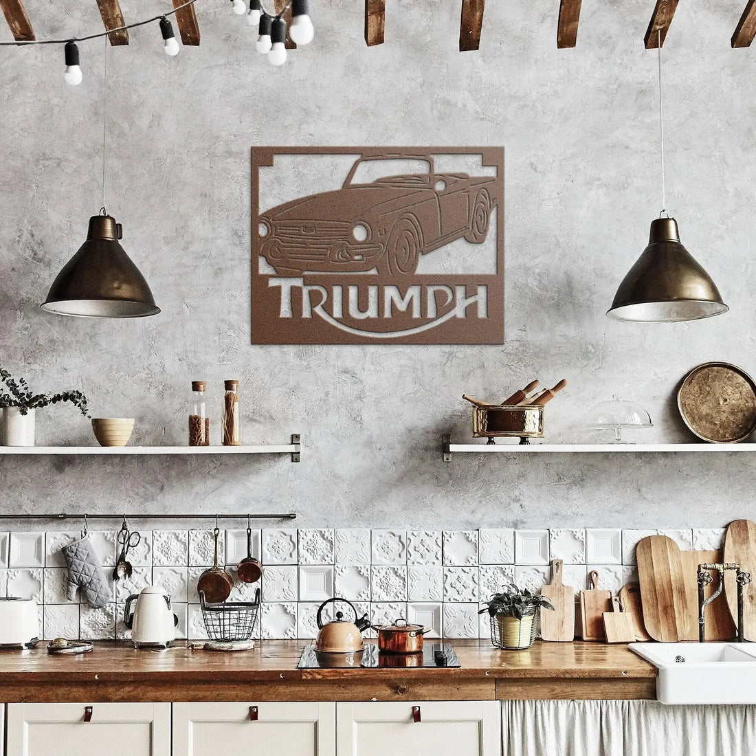 Kitchen interior with a Triumph car wall art piece on a gray wall.